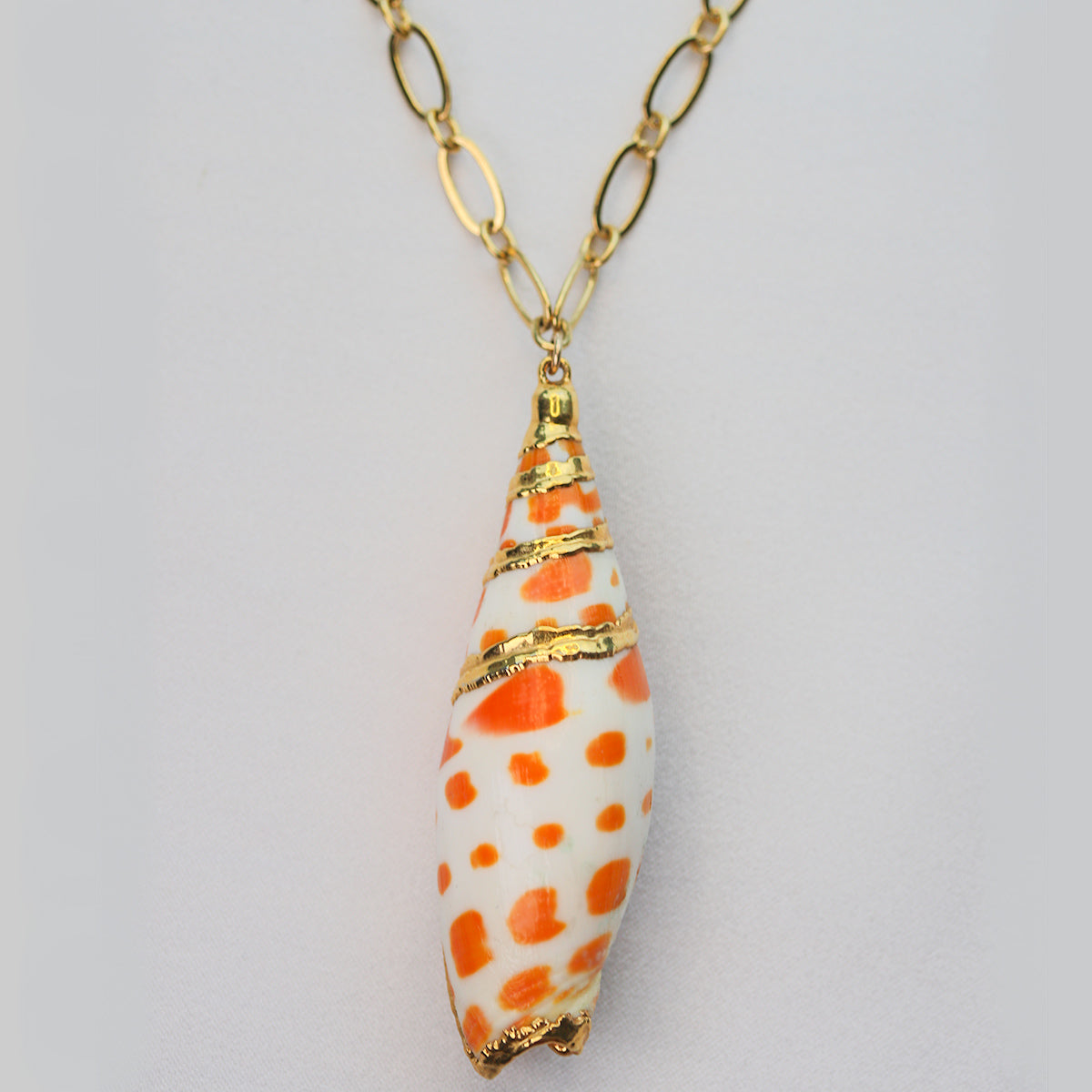 orange spotted spiral shell necklace gold filled chain